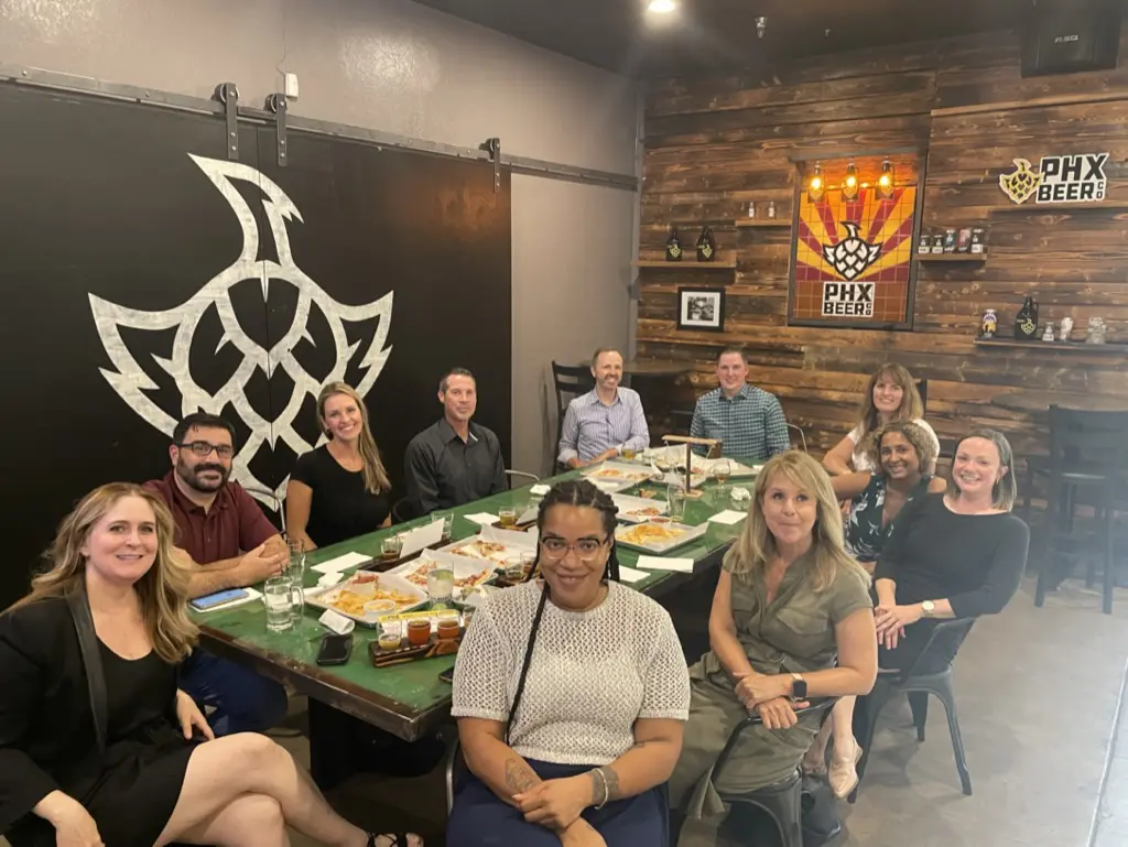 Group of people dining at a restaurant.