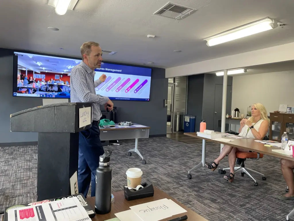 Man presenting in a meeting room.