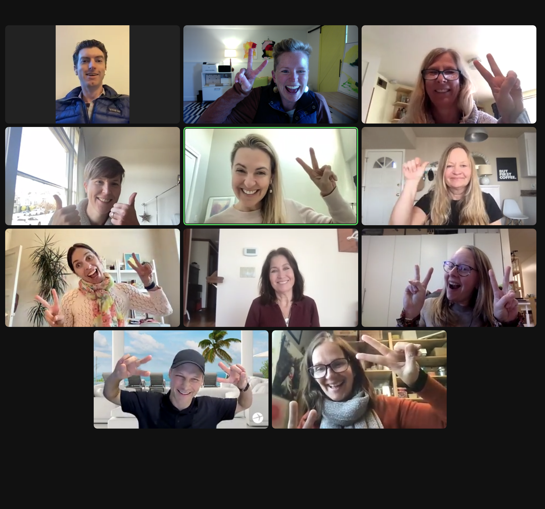 People smiling in a virtual meeting screenshot.